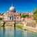 A bridge over the Tiber River in front of Saint Peter’s Basilica
